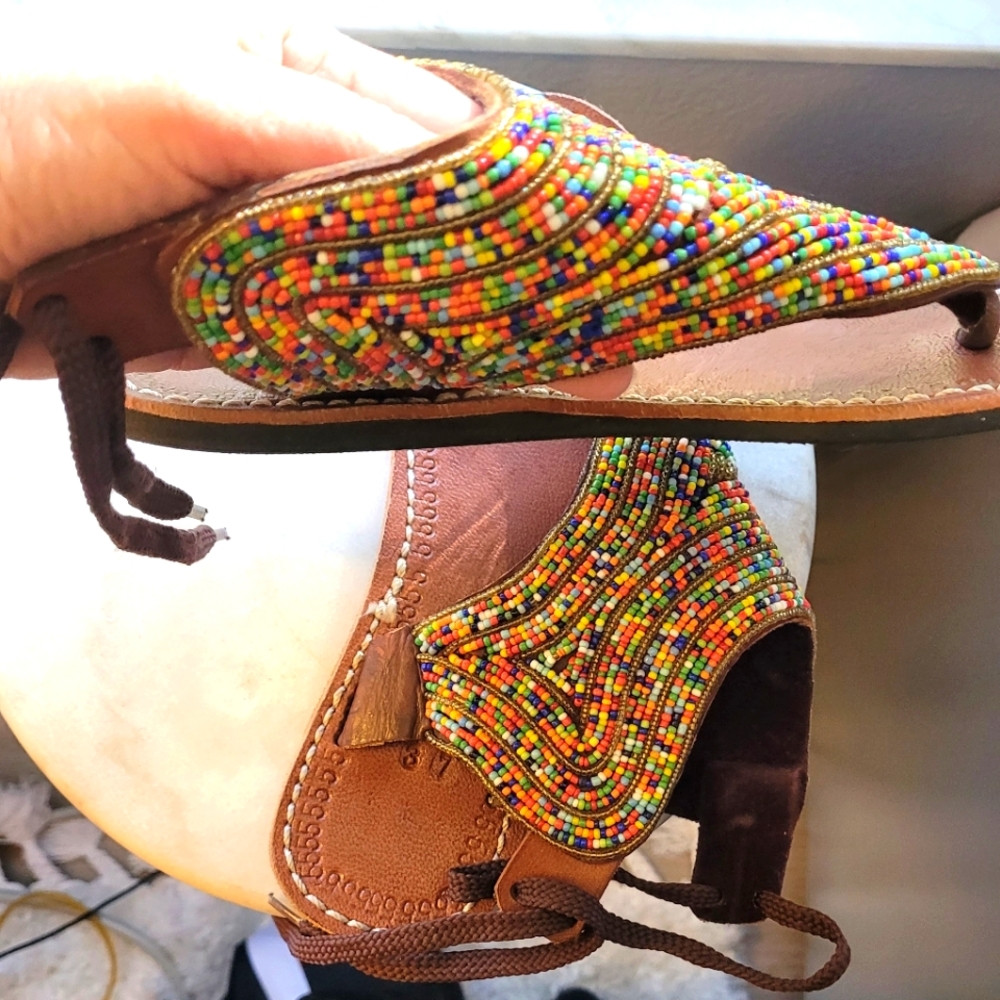 Colorful beaded, leather sandals.